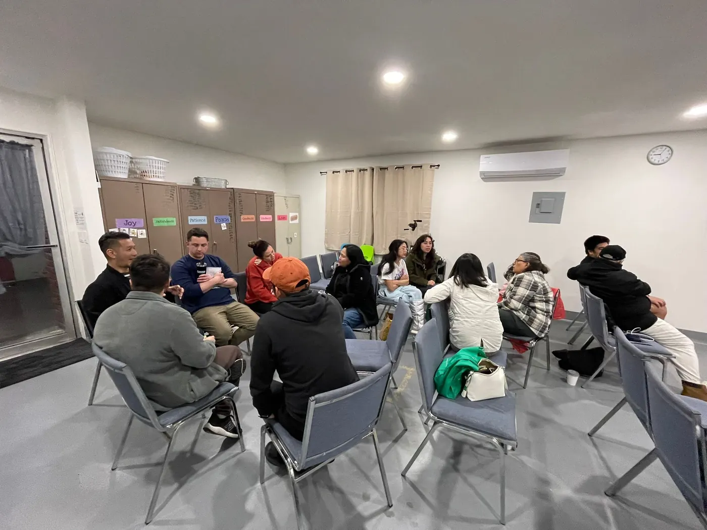 A group praying together in a home